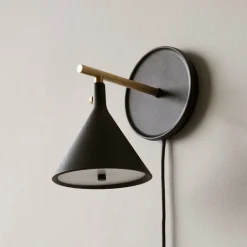 Audo LED-væglampe Cast, sort, IP44, dæmper, stik