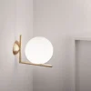 FLOS IC C/W1 væglampe, børstet messing
