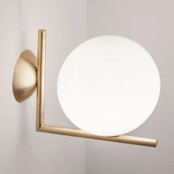 FLOS IC C/W1 væglampe, børstet messing