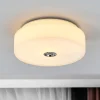 FLOS Mini Button loftlampe lavet af glas