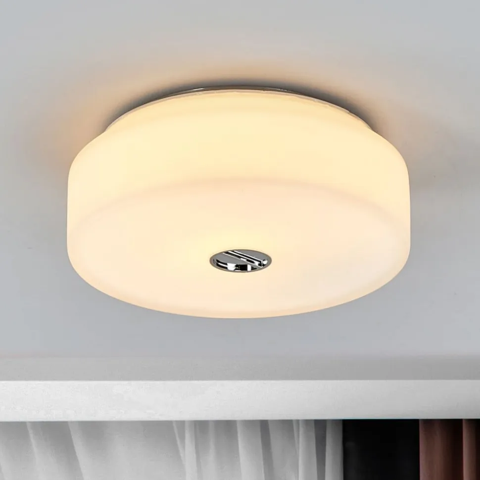FLOS Mini Button loftlampe lavet af glas