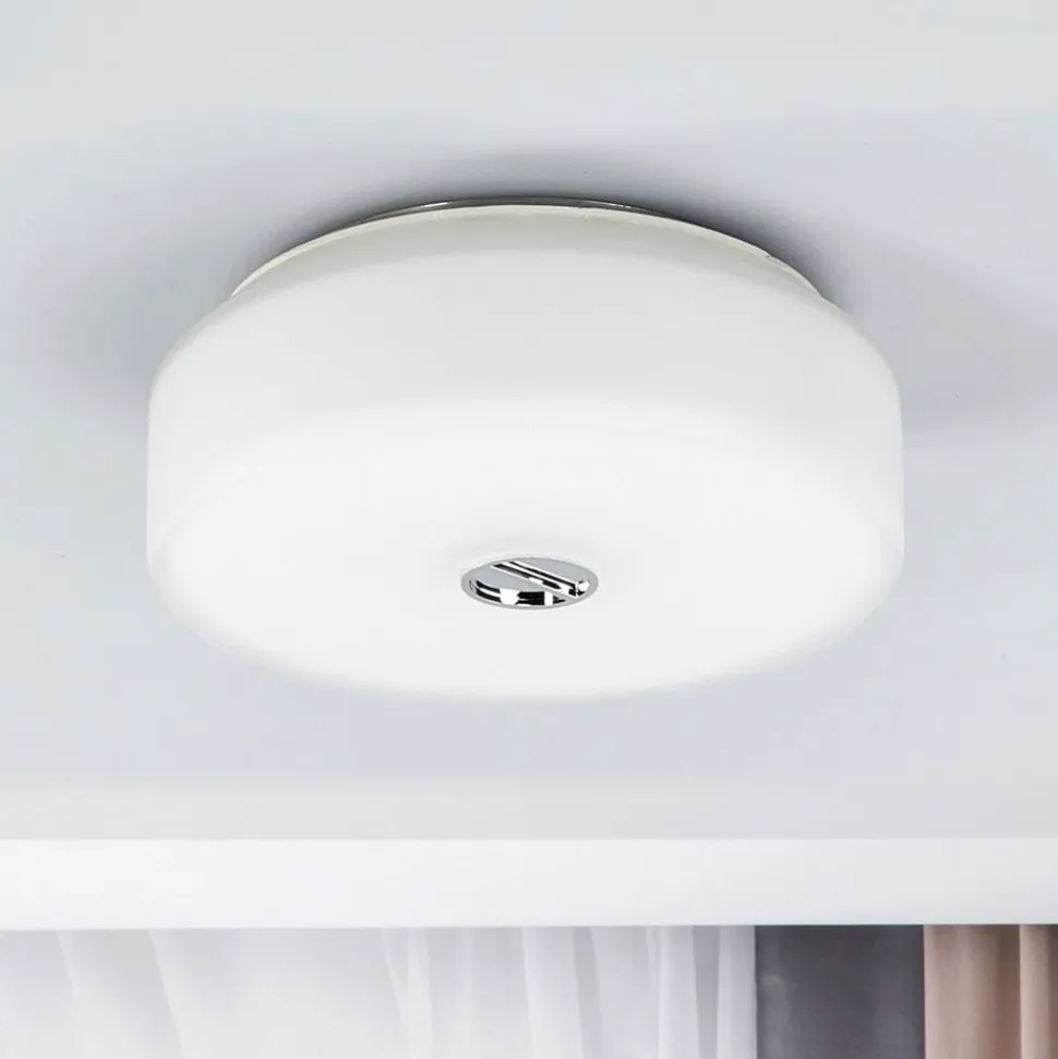 FLOS Mini Button loftlampe lavet af glas