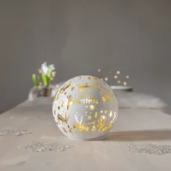 Kugleformet LED-lampe Merry X-Mas Ø 15cm hvidt glas batteridrevet