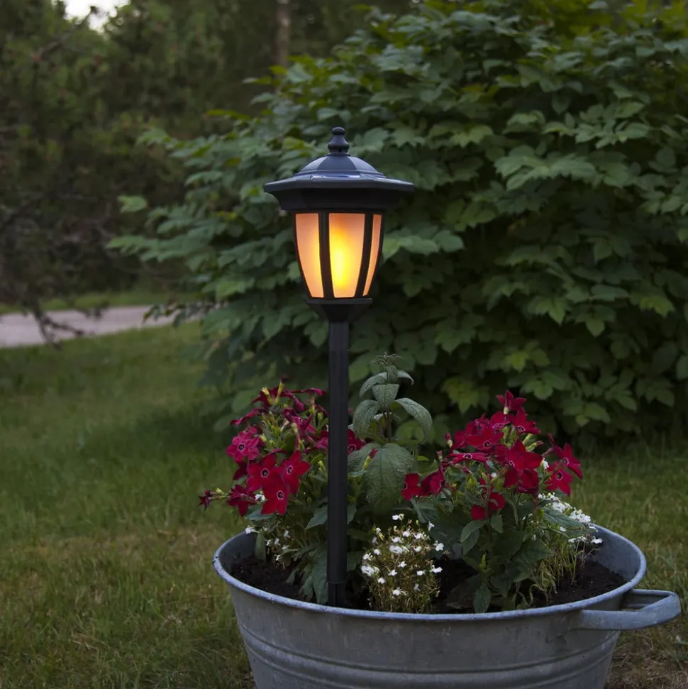 LED-solcellelampe Flame, 4-i-1, sort