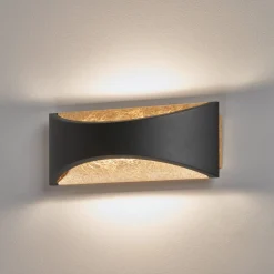 LED-væglampe Rio, sort/bladguld, bredde 23 cm, metal