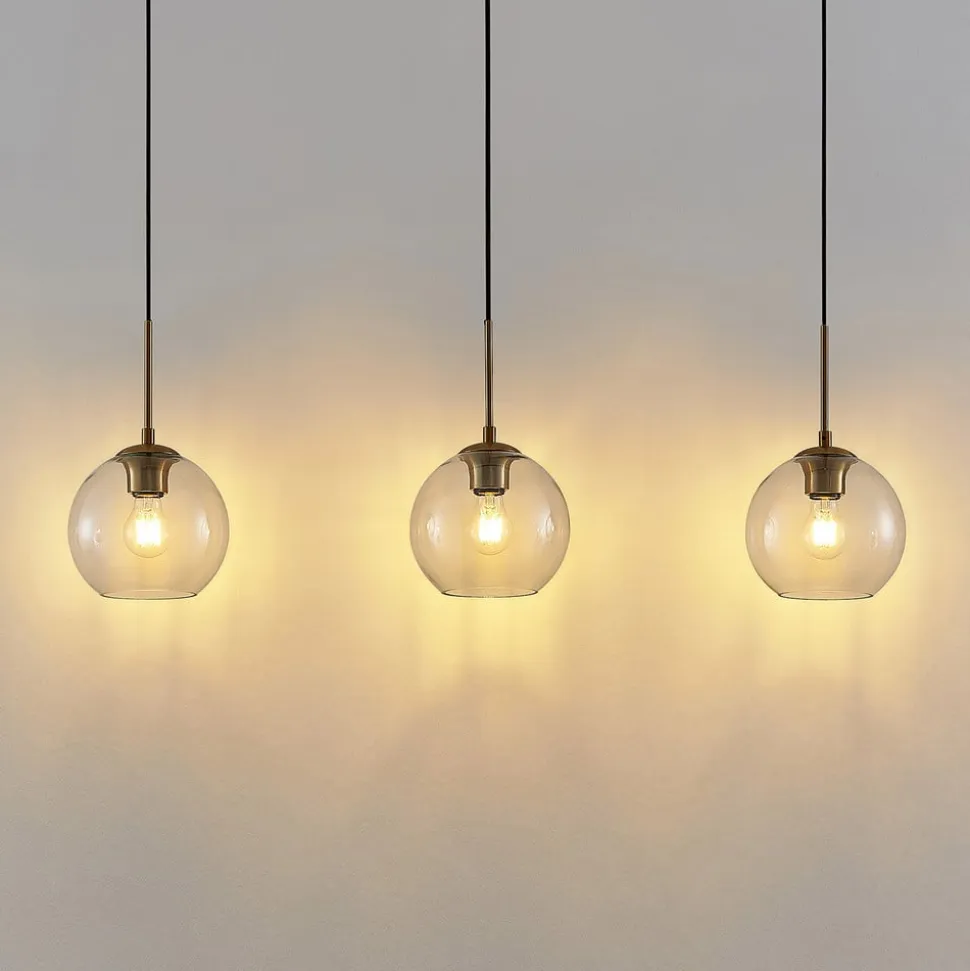Lindby Grady hængelampe, messing/klar, 110 cm, metal, glas