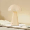 Lindby LED genopladelig bordlampe Nevijo, beige, Ø20cm, USB, dæmper