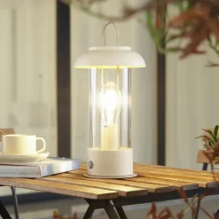 Lindby LED genopladelig bordlampe Yvette, abrikos-beige, IP44, touch