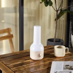 Lindby LED-bordlampe Isaline, beige, dæmpbar, IP44