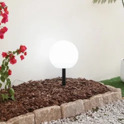 Lindby LED-solcellelampe Lago, Ø 25 cm, kugle, jordspyd, hvid