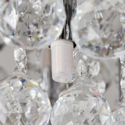 Lindby loftlampe Antonino, 8 lyskilder, krom, krystal, 55 cm