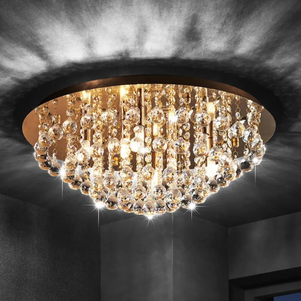 Lindby loftlampe Gillion, 8 lyskilder, guld, krystal, Ø 55cm