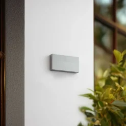 Lindby udendørs LED-væglampe Jarte, grå, metal, 17 cm, IP54