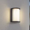 Lindby udendørs LED-væglampe Calvik, sort, riflet, IP44