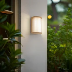 Lindby udendørs LED-væglampe Calvik, beige, riflet, IP44