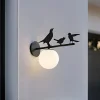 Lindby udendørs væglampe Lintu, metal, sort, IP44, fugl