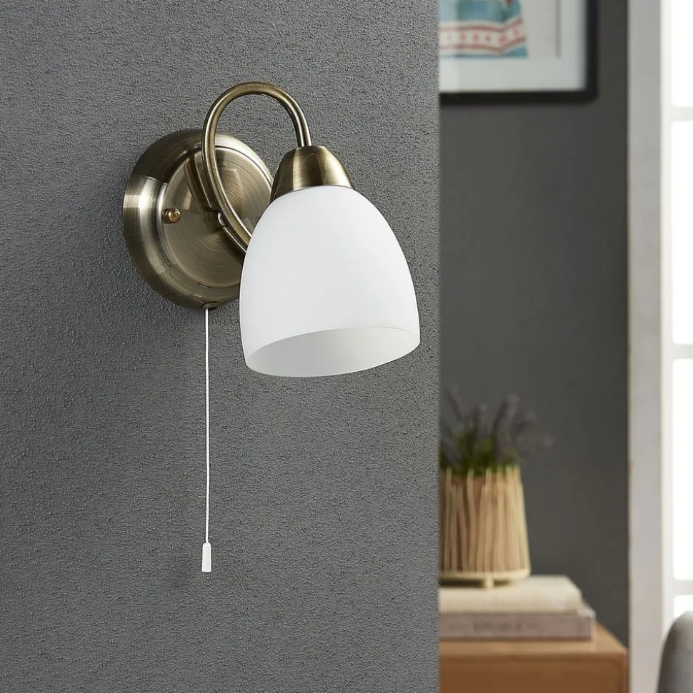 Lindby væglampe Mael, højde 20 cm, antik messing, trækkontakt