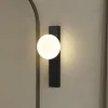 Lindby væglampe Tavrik, sort/hvid, højde 30 cm, glas
