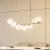 Lucande hængelampe Isandro, 95 cm, guld, hvid, 7 lyskilder, G9
