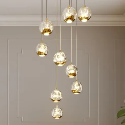 Lucande LED-hængelampe Hayley, Ø 40 cm, 9 lyskilder, guld, glas