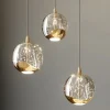 Lucande LED-pendellampe Hayley, Ø 25 cm, 3 lyskilder, guld, glas