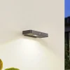 Lucande LED-solcelle-væglampe Tavon, kantet, sort, sensor