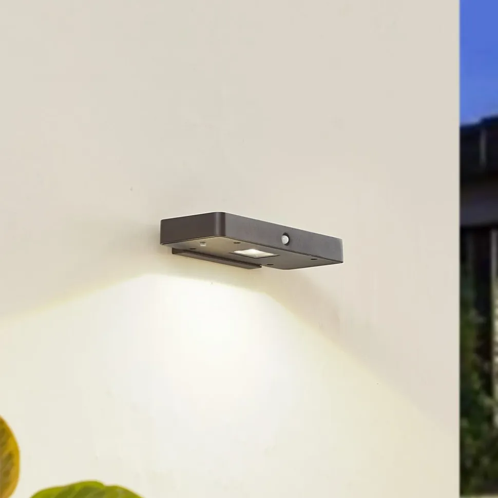 Lucande LED-solcelle-væglampe Tavon, kantet, sort, sensor
