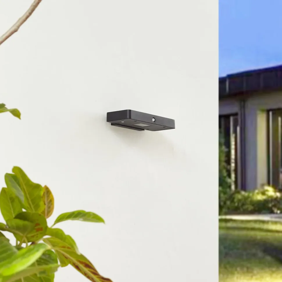 Lucande LED-solcelle-væglampe Tavon, kantet, sort, sensor