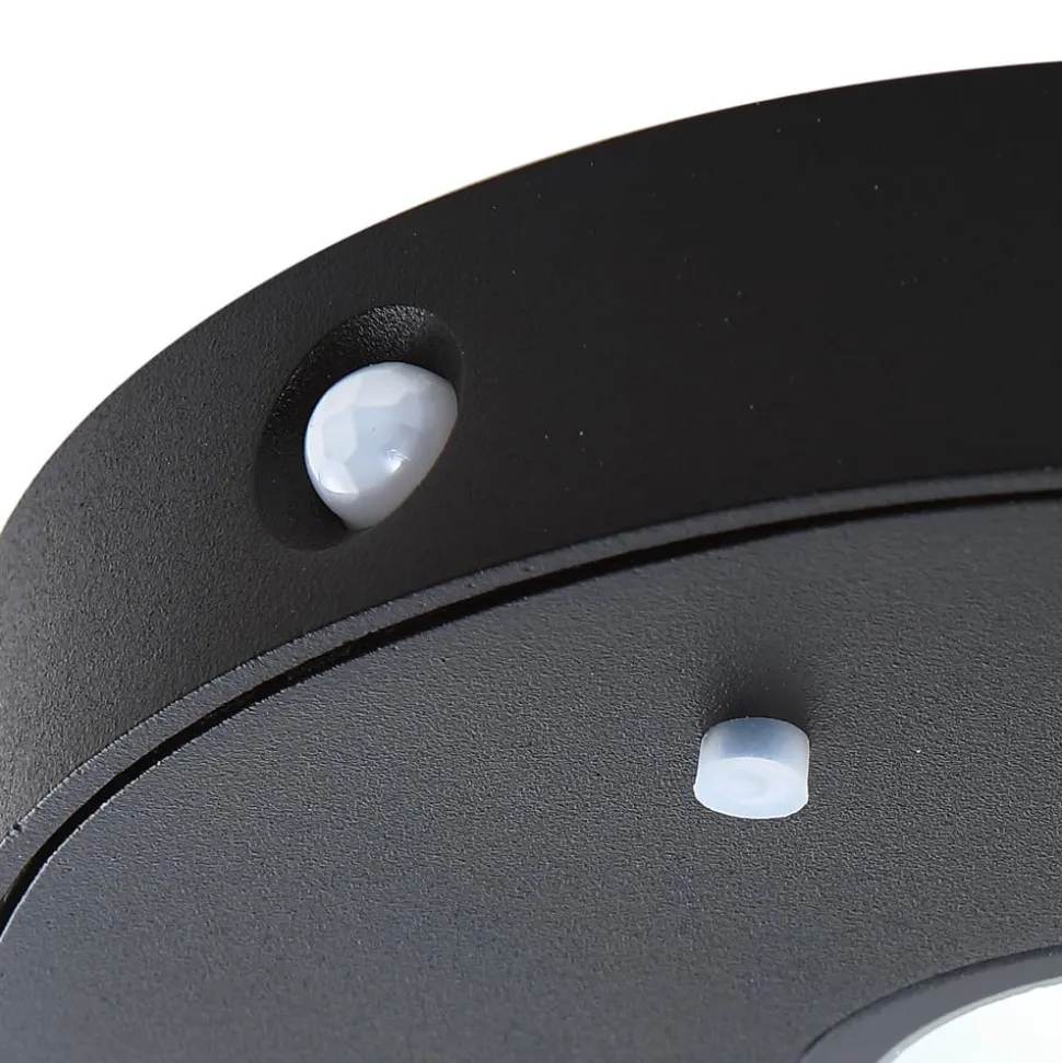 Lucande LED-solcelle-væglampe Tavon, rund, sort, sensor