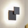 Lucande LED-væglampe Elrik, sort, 27 cm høj, metal
