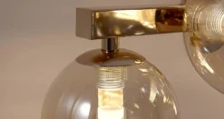 Maytoni Dallas væglampe med 9 glaskugler, guld