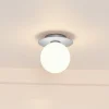 Nuura Liila 1 Medium væglampe IP44, sølv/hvid, varmhvid