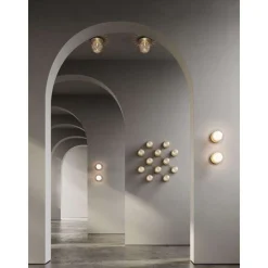 Nuura væglampe Liila 1, IP44, Ø 16,5 cm, sølv/klar