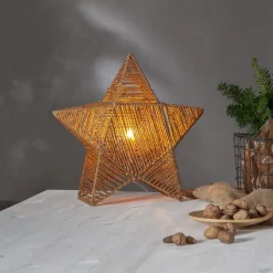 Rappe dekostjerne af papirsnører, stående