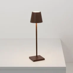 Zafferano LED-batteridrevet bordlampe Poldina micro, rustbrun, IP65